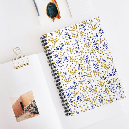 SPIRAL NOTEBOOK, DURABLE COVER, RULED, 6X8 – SPRING BRANCHES, features a blue-and-mustard botanical pattern, centered in a desktop still life with stylish accessories, embodying FireBrook Essentials' uplifting, joyful design ethos.
