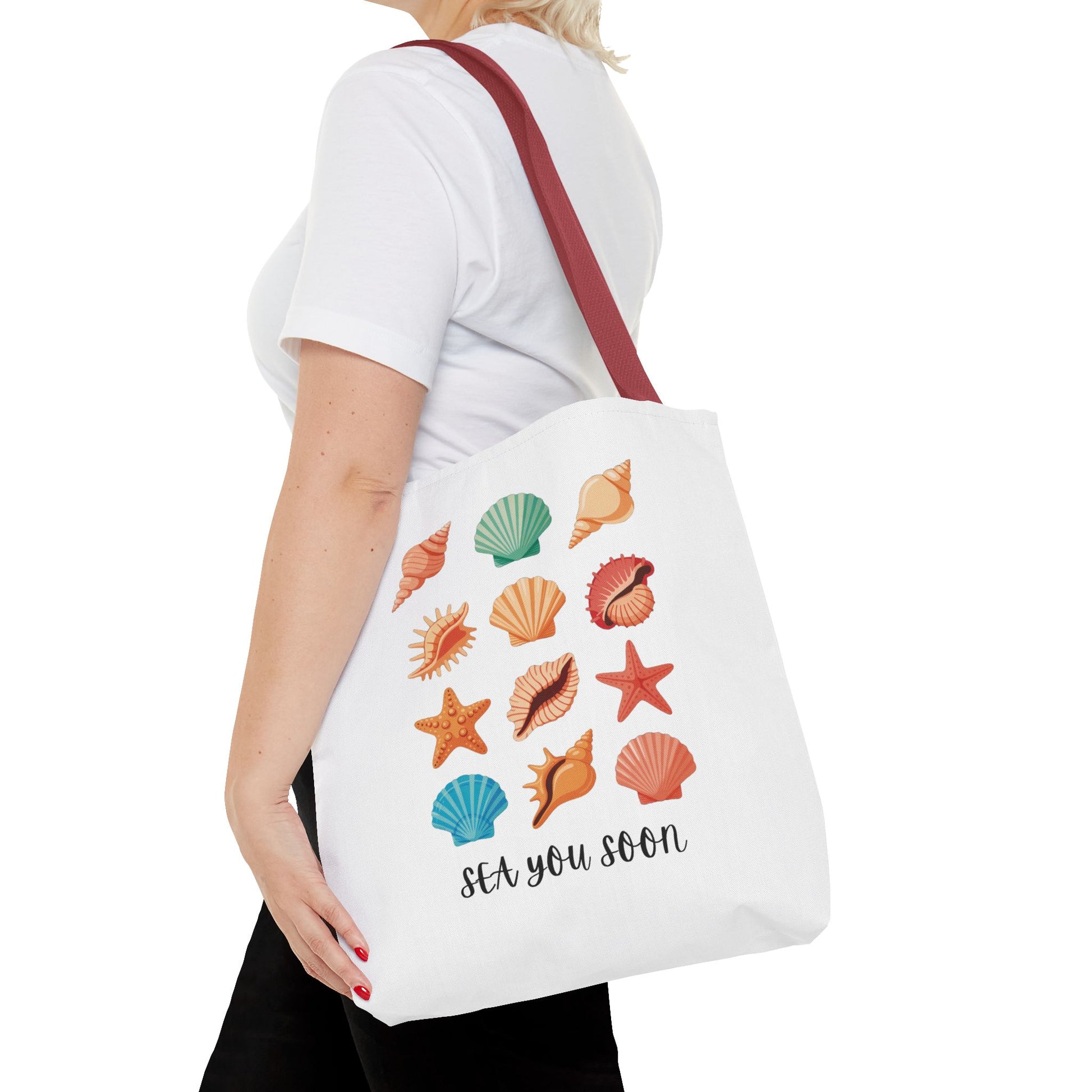 Sea You Soon Sea Shells Tote Bag featuring a beachy design with seashells, perfect for ocean lovers. Ideal for beach trips or casual outings, embodying FireBrook Essentials' uplifting and stylish approach.