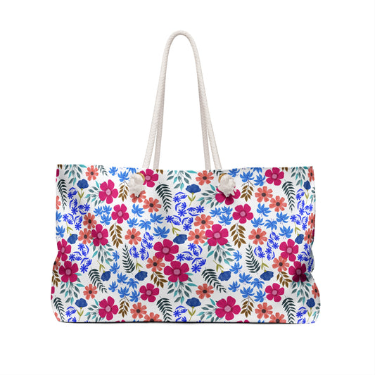 Weekender Bag with a vibrant, watercolor floral pattern and twisted-rope handles, ideal for stylish weekend getaways. Crafted from wrinkle-resistant polyester, it features a spacious interior and T-bottom design.