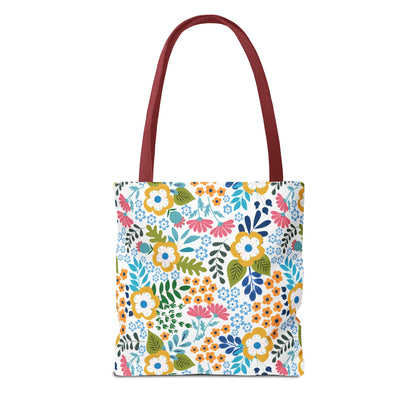 Floral Tote Bag with long burgundy straps, features a vibrant floral pattern on a white background, ideal for summer outings. Designed for durability and style by FireBrook Essentials.