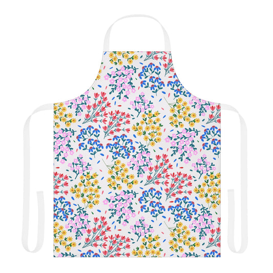 Floral Apron: A full-coverage, white apron featuring a vibrant, repeating floral pattern. Made from soft polyester canvas with neck and waist ties, perfect for adding joy to any kitchen activity.