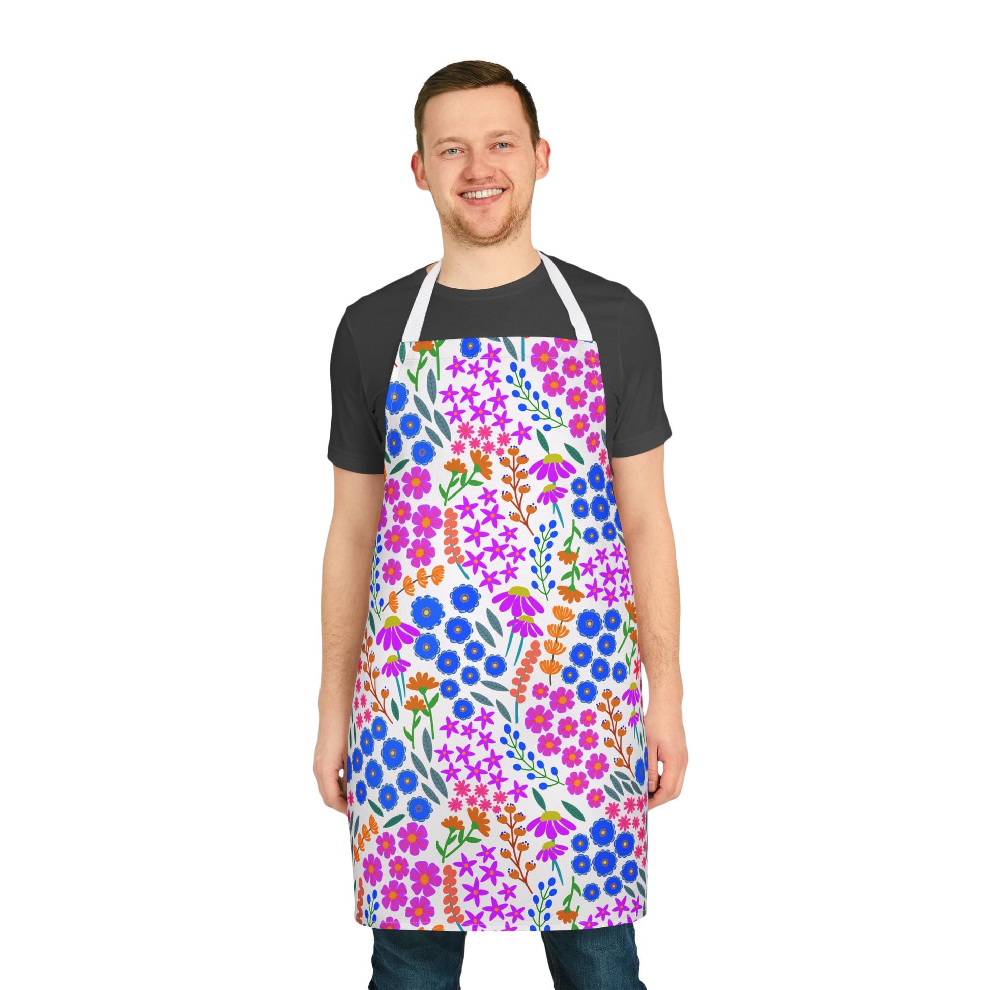 Floral Apron features a vibrant floral pattern on a young man, offering stylish, stain-free protection. Made from soft polyester canvas, it's ideal for cooking, baking, or crafting, enhancing your joyful moments.