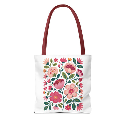 Pink Floral Folk-Art Style Tote Bag featuring vibrant floral illustrations with pink tones, dusty green leaves, and subtle navy accents. Ideal for everyday use, providing both functionality and artistic flair.