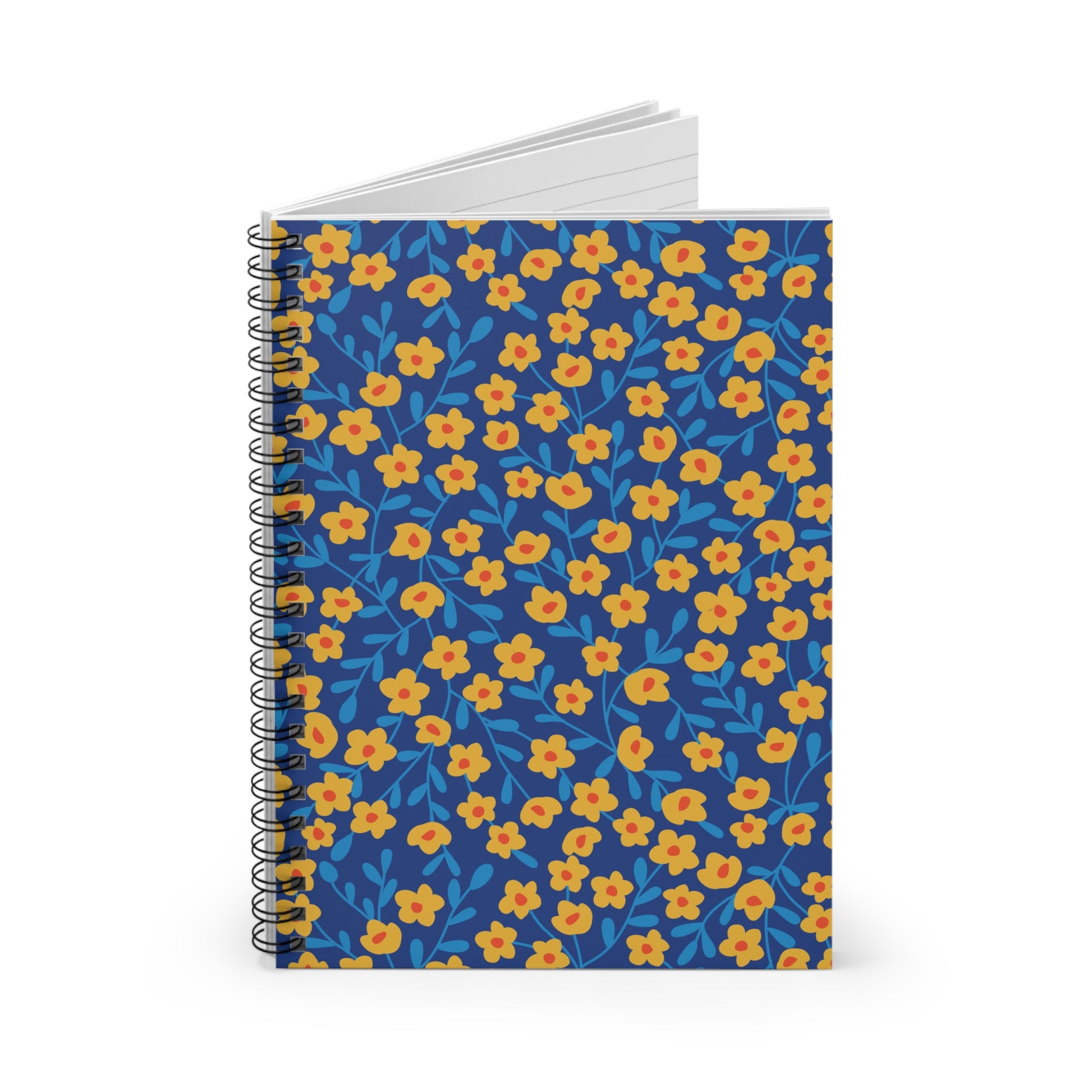Floral Spiral Notebook with yellow blossoms and blue stems on a navy cover stands upright, showcasing its sleek metal spiral binding and lined pages, embodying FireBrook Essentials' uplifting, creative spirit.