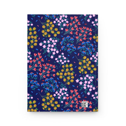HARDCOVER JOURNAL, MATTE, RULED, 5X7, SEWN BIND, CLEAN-TEAR PAGES – MIDNIGHT BLOOM features a floral-patterned cover with daisies and buds, finished with a small barcode, embodying FireBrook Designs' uplifting style.