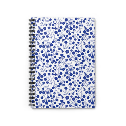 Floral Spiral Notebook with vibrant blue flowers and butterflies on a white cover, features a durable metal coil binding for easy page turning, ideal for creative notes and sketches.