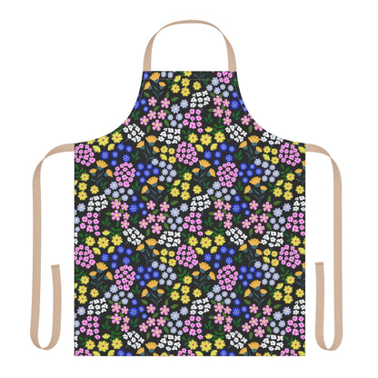 Apron Floral Design: A stylish kitchen apron with a vibrant floral pattern on black, featuring beige straps. Made from soft polyester canvas, it's perfect for baking or crafting. Designed by FireBrook Essentials for comfort and joy.