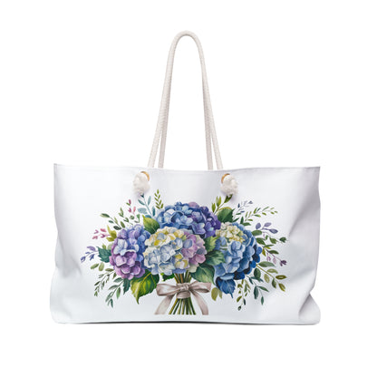 Weekender Bag - Hydrangea Bouquet: A stylish shoulder bag adorned with a detailed hydrangea bouquet design, featuring rope handles and a generous size, perfect for chic, functional travel.