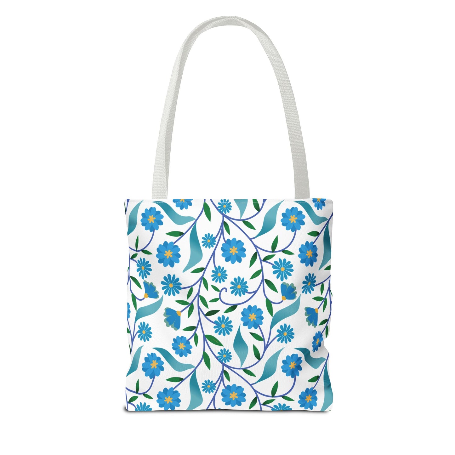 Blue Floral Tote Bag featuring a vibrant botanical pattern of blue flowers and green leaves on white. Perfect for summer outings, this durable tote embodies FireBrook Designs' joyful and stylish essence.