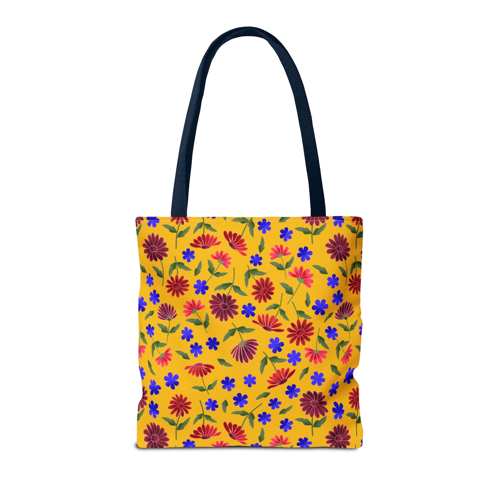 Golden Wildflower Tote Bag, featuring a cheerful yellow background with vibrant red and blue floral patterns and green leaves. Navy-blue handles and reinforced stitching add durability, perfect for joyful, everyday use.