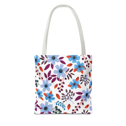 Floral Tote Bag featuring a vibrant design with blue and lavender blossoms, dark berries, and leaves. Ideal for summer outings, this durable, stylish bag embodies FireBrook Designs' uplifting and joyful essence.