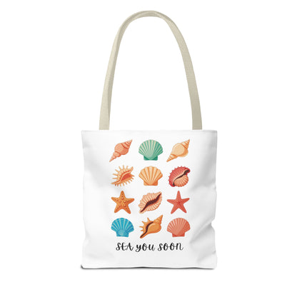 Sea You Soon Sea Shells Tote Bag featuring a beachy design with seashells, ideal for ocean lovers. Crafted from durable polyester with reinforced handles, perfect for summer outings and coastal living.