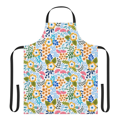 Floral Apron features a vibrant, stylized floral pattern with black straps, ideal for cooking or crafting. Made from 100% polyester canvas, it combines comfort with a splash of color.