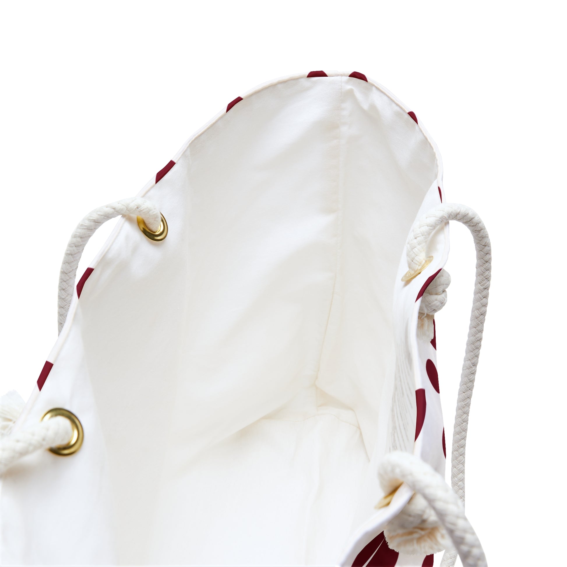 Burgundy Weekender Bag with cream rope handles and gold grommets, exemplifying FireBrook Essentials' stylish and practical design for joyful travel. Perfect for weekend getaways, with durable features for effortless chic.