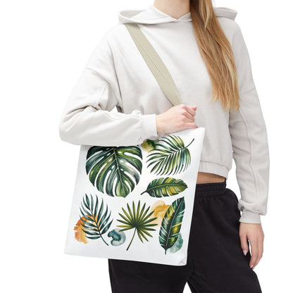 Tropical Leaves Tote Bag featuring a vibrant leaf pattern, highlighted in a close-up shot. Ideal for stylish, eco-conscious beach trips or shopping, embodying FireBrook Essentials' joyful and uplifting design ethos.