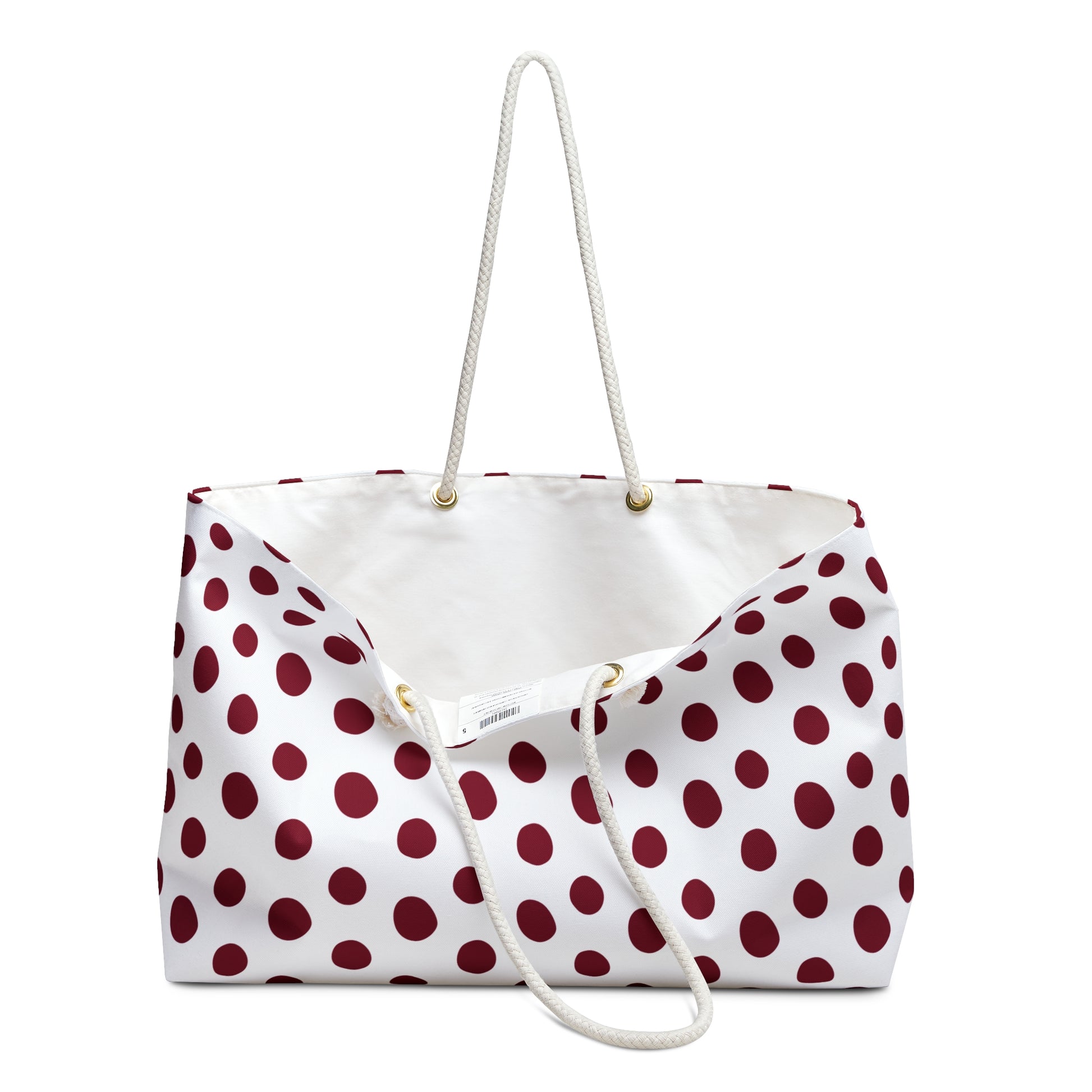 Burgundy Weekender Bag with cream rope handles and gold grommets, offering ample space for travel essentials. Perfect for stylish, joyful trips, aligning with FireBrook Essentials' uplifting design ethos.