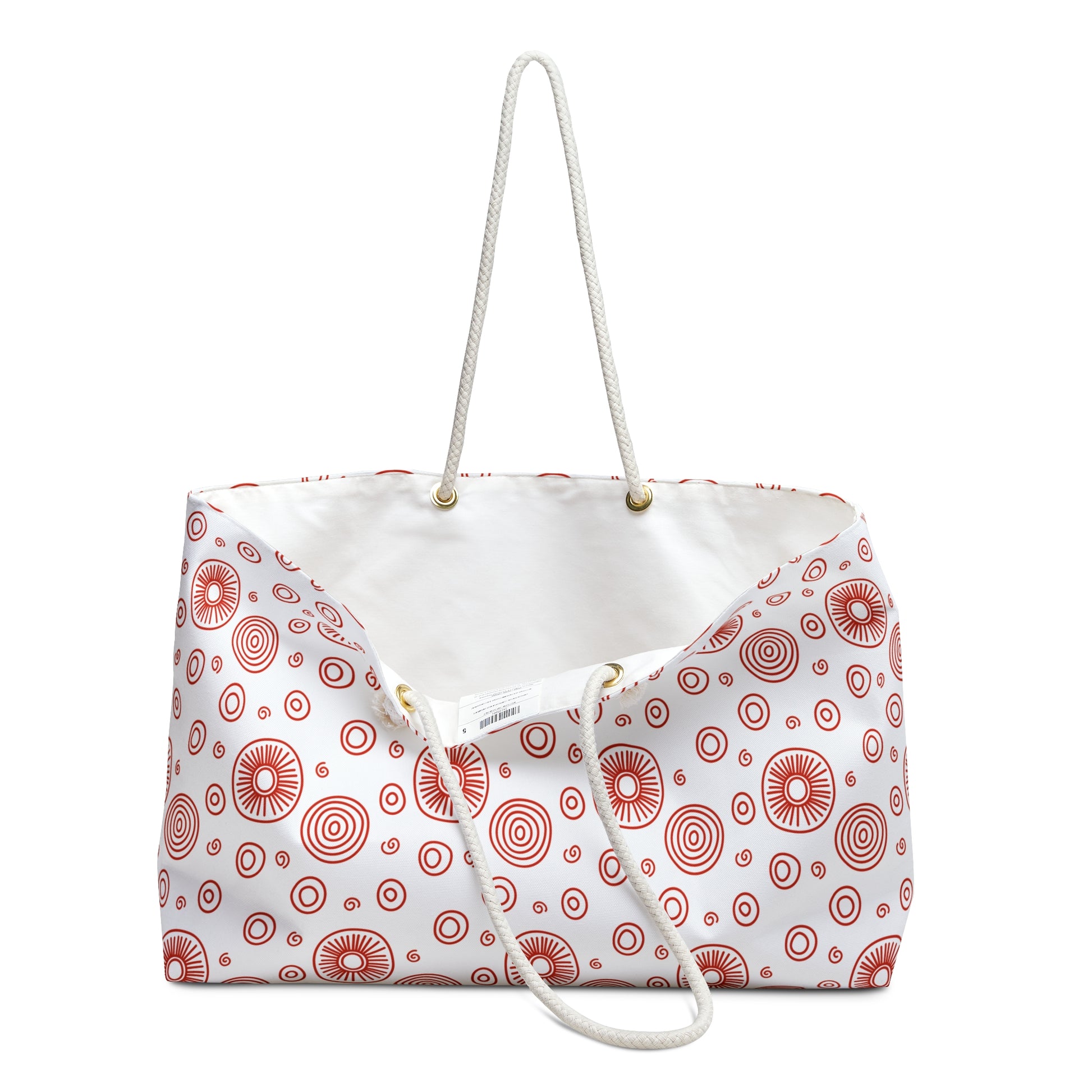 Weekender Bag - Red Swirls and Circles Design: A close-up shows durable polyester fabric with bold red patterns and sturdy rope handles, embodying FireBrook Essentials' stylish, practical aesthetic for joyful, easy travel.