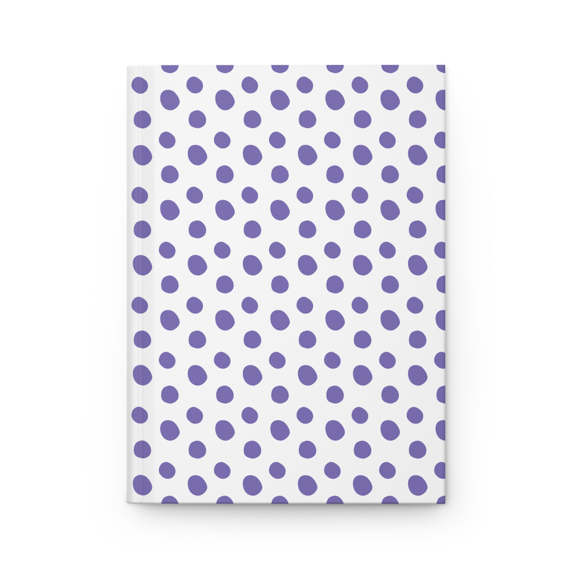 HARDCOVER JOURNAL, MATTE, RULED, 5X7, SEWN BIND, CLEAN-TEAR PAGES – INDIGO: A white cover adorned with purple polka dots, offering a smooth matte finish and durable sewn binding.