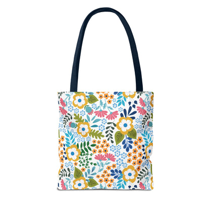 Floral Tote Bag featuring a vibrant floral pattern with navy straps. Ideal for summer outings, this durable, spacious bag embodies FireBrook Designs' uplifting style, perfect for joyful, everyday use.