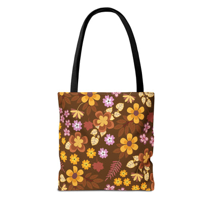 Floral Tote Bag featuring a vibrant floral pattern on a rich brown background with long black straps, designed for durability and style, perfect for summer outings and joyful occasions.