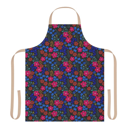 Apron Floral Design: A full-coverage apron with vibrant floral patterns on a dark fabric, featuring tan neck and waist ties. Made from soft, stain-free polyester canvas, ideal for cooking or crafting.