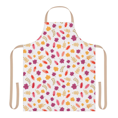 The Apron Floral Design features a white base with a repeating pattern of autumn leaves, complemented by tan straps. Made from soft, stain-free polyester, it embodies FireBrook Designs' commitment to comfort and style.
