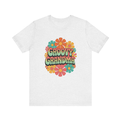 Groovy Grandma for Mother's Day Bella+Canvas Unisex T-Shirt features a vibrant floral design, ideal for vintage lovers. This comfortable, stylish top embodies FireBrook Essentials' commitment to joyful, uplifting apparel.