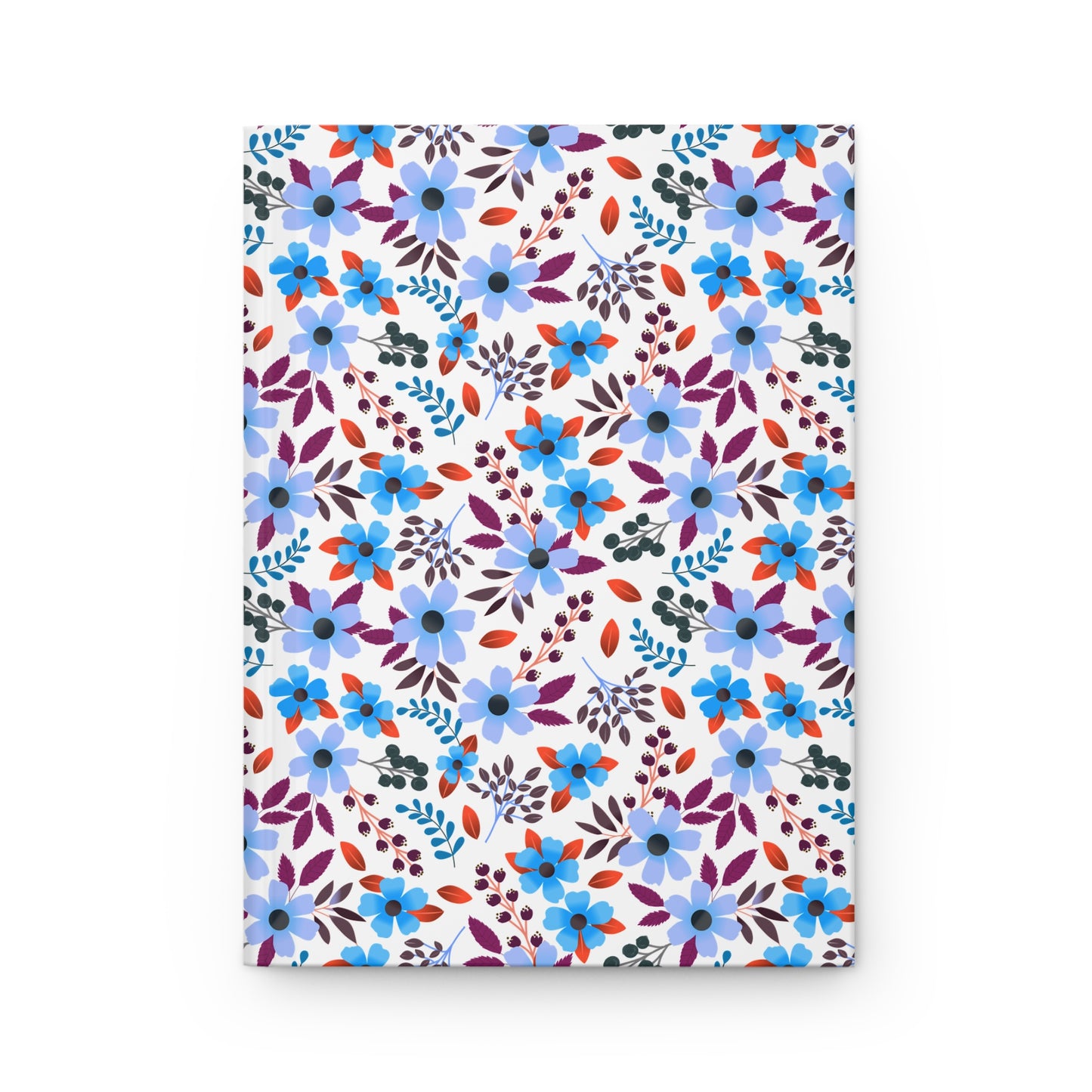 HARDCOVER JOURNAL, MATTE, RULED, 5X7, SEWN BIND, CLEAN-TEAR PAGES – BLOOM BRIGHTLY features a seamless floral pattern with blue flowers, purple and burgundy leaves, and berry-like clusters on a white background.