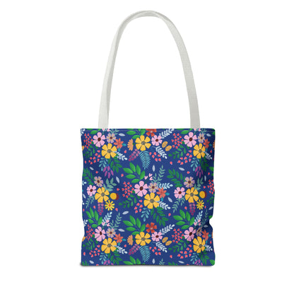 Deep Sea Floral Patch Tote Bag with white shoulder straps, featuring a vibrant floral pattern on navy-blue. Perfect for summer outings, blending style and functionality with durable polyester and reinforced stitching.