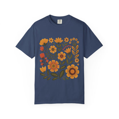 Folk Art in Warm Yellows Floral T-Shirt showcases a vibrant folk art-inspired floral pattern. Designed in earthy tones, this relaxed-fit tee embodies the artistic, joyful essence of FireBrook Essentials.