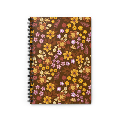 Floral Spiral Notebook featuring an autumnal floral motif with warm shades, standing upright. Ideal for creative tasks, this compact, eco-friendly notebook inspires joyful productivity with its durable metal spiral binding.