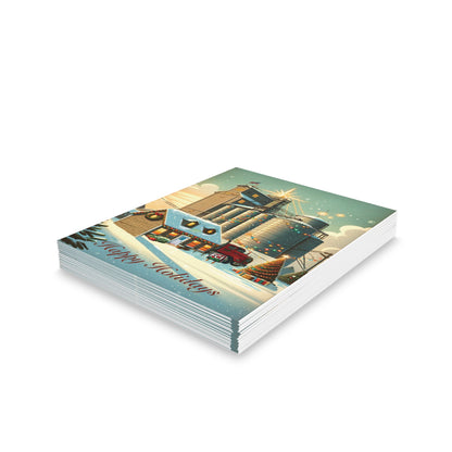 Greeting Cards —Mill - Pack of 8/16/24 features snow-covered rural scenes at dusk with festive lights, a decorated tree, and a red truck, perfect for sending joyful, personalized messages.