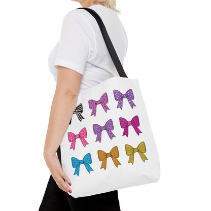 Woman carrying the Bows Ribbons Tote Bag, featuring playful bow designs. Ideal for stylish, practical use with spacious interior and durable construction.