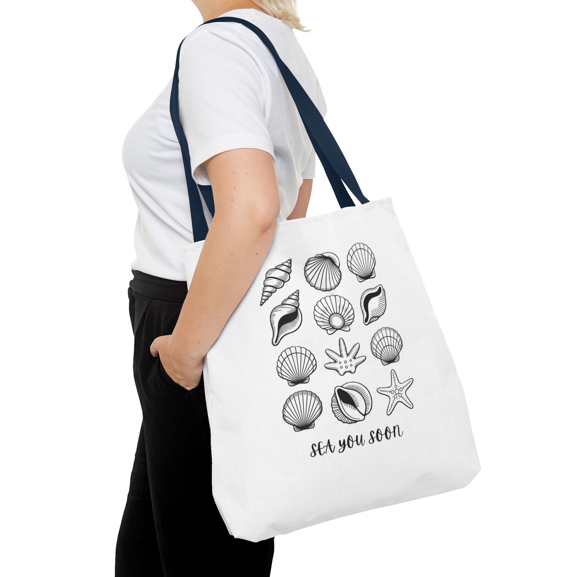 Sea Shells Tote Bag featuring a nautical design, crafted from durable polyester with reinforced stitching and boxed corners, ideal for beach trips and picnics, embodying FireBrook Essentials' uplifting and practical style.