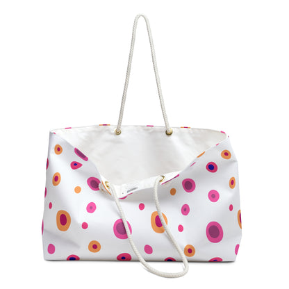 Travel Bag Yellow and Pink Circles: A stylish, vibrant weekender with rope handles, perfect for cheerful travel adventures. Durable, spacious, and wrinkle-resistant, ideal for joyful getaways, embodying FireBrook Designs' uplifting essence.