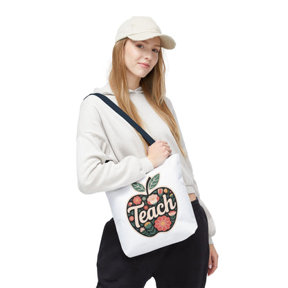 Floral Apple Tote Bag - Hand-Drawn Pastel-Colored Design with 'TEACH', showcasing a vibrant apple shape filled with delicate, pastel florals. Ideal for teachers and nature enthusiasts, embodying FireBrook Essentials' uplifting style.