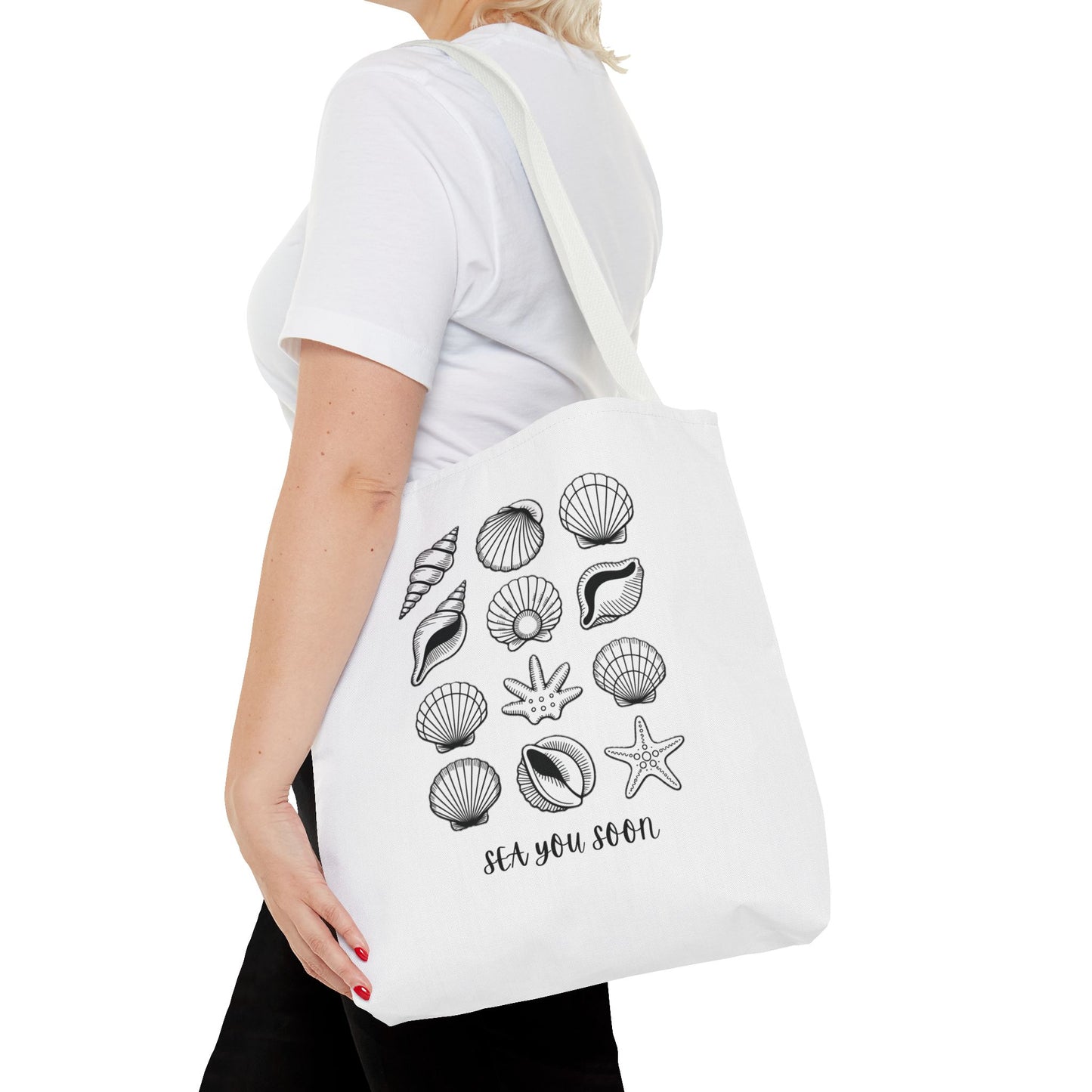 Sea Shells Tote Bag showcasing a beachy vibe with durable polyester fabric, reinforced stitching, and spacious boxed corners—ideal for beach lovers and coastal enthusiasts seeking style and functionality.