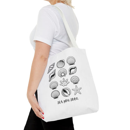 Sea Shells Tote Bag showcasing a beachy vibe with durable polyester fabric, reinforced stitching, and spacious boxed corners—ideal for beach lovers and coastal enthusiasts seeking style and functionality.
