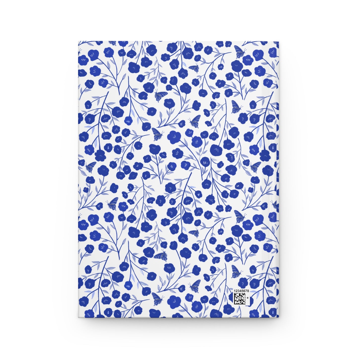 HARDCOVER JOURNAL, MATTE, RULED, 5X7, SEWN BIND, CLEAN-TEAR PAGES – INDIGO PETALS features a cobalt blue floral pattern with butterflies on a white background, with a matte laminated cover and sewn binding.