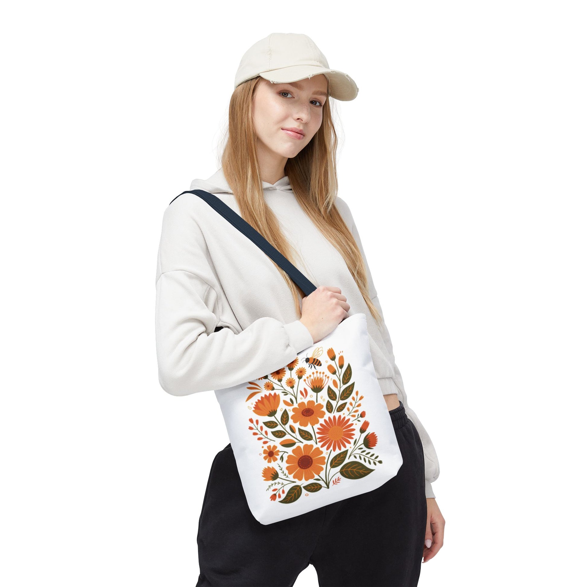 Folk Floral Tote Bag showcasing vibrant, hand-drawn wildflowers in warm hues on a white background. Ideal for nature lovers, this durable, stylish tote from FireBrook Essentials is perfect for daily use.