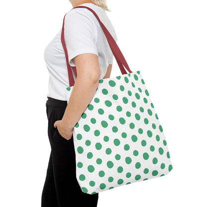 Green Polka Dots Tote Bag with green and white polka dot pattern, held by a woman, showcasing its playful design and reinforced handles, ideal for adding color to everyday outfits.