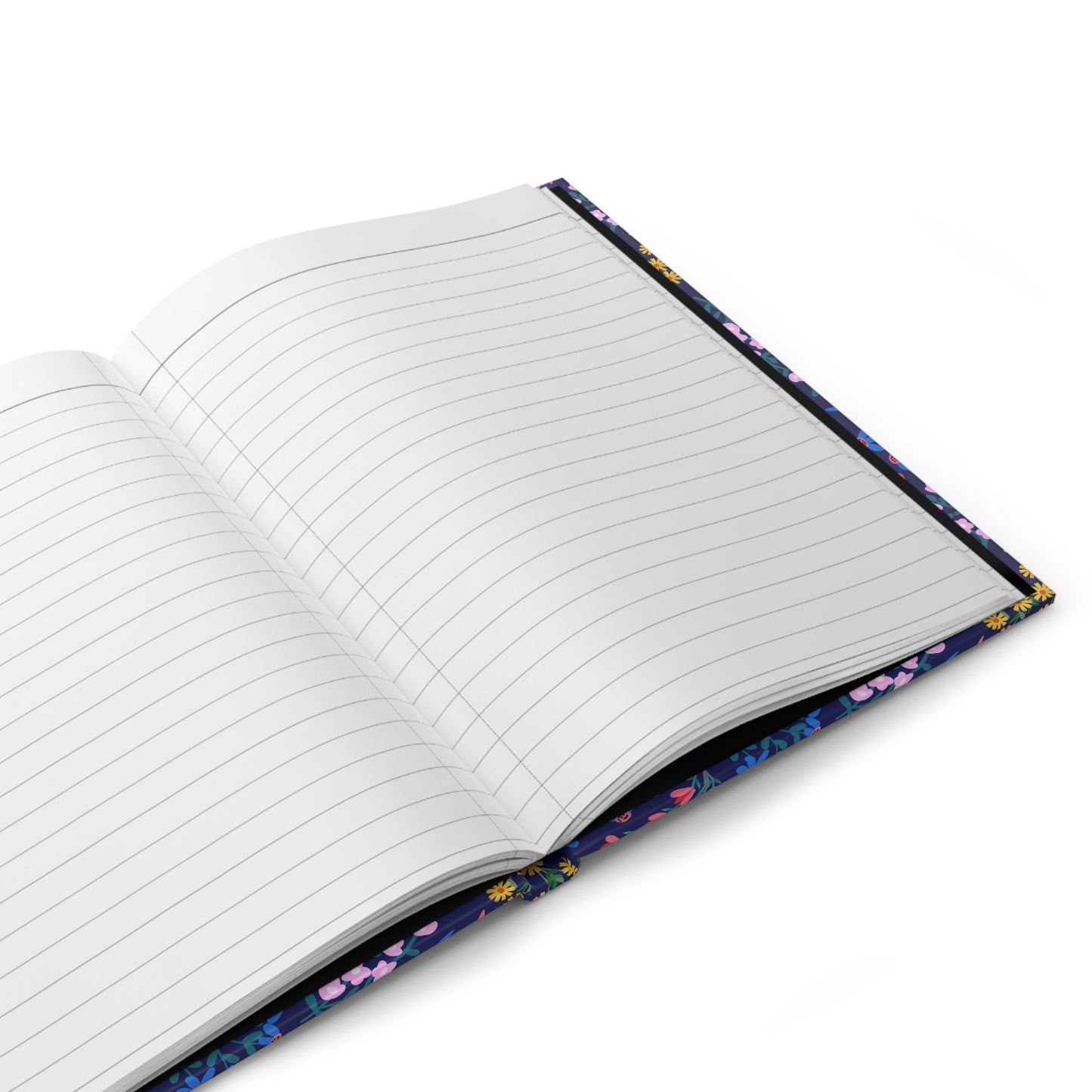 HARDCOVER JOURNAL, MATTE, RULED, 5X7, SEWN BIND, CLEAN-TEAR PAGES – MIDNIGHT BLOOM, featuring a dark-blue cover with colorful florals, open to show lined pages, perfect for capturing thoughts.