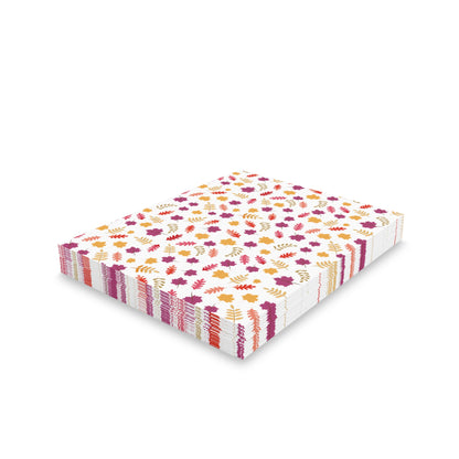 Autumn Greeting Cards — Pack of 8/16/24 featuring a stack of cards adorned with vibrant autumn-leaf motifs, showcasing FireBrook Designs' uplifting style. Each card comes with a matching white envelope.