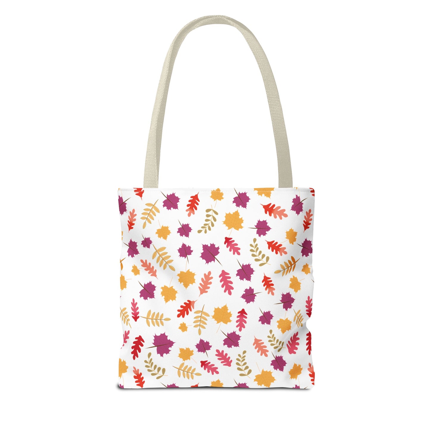 Autumn Leaves Tote Bag showcasing a vibrant pattern of scattered autumn leaves in orange, red, mustard, and plum, features natural-colored handles. Designed for durability with reinforced stitching and boxed corners for added space.