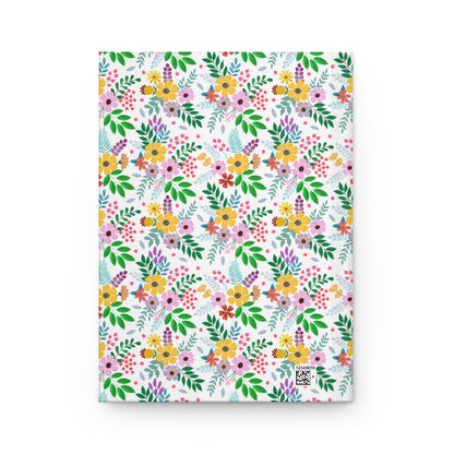 HARDCOVER JOURNAL, MATTE, RULED, 5X7, SEWN BIND, CLEAN-TEAR PAGES – BOTANICAL BURST featuring a vibrant floral pattern in bouquets, with a subtle QR code on a durable matte-laminated cover.
