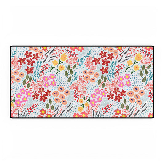 Garden Floral Pattern Desk Mat featuring vibrant blossoms and leaves on a white background, framed by a thin black border, adding elegance and color to any workspace.