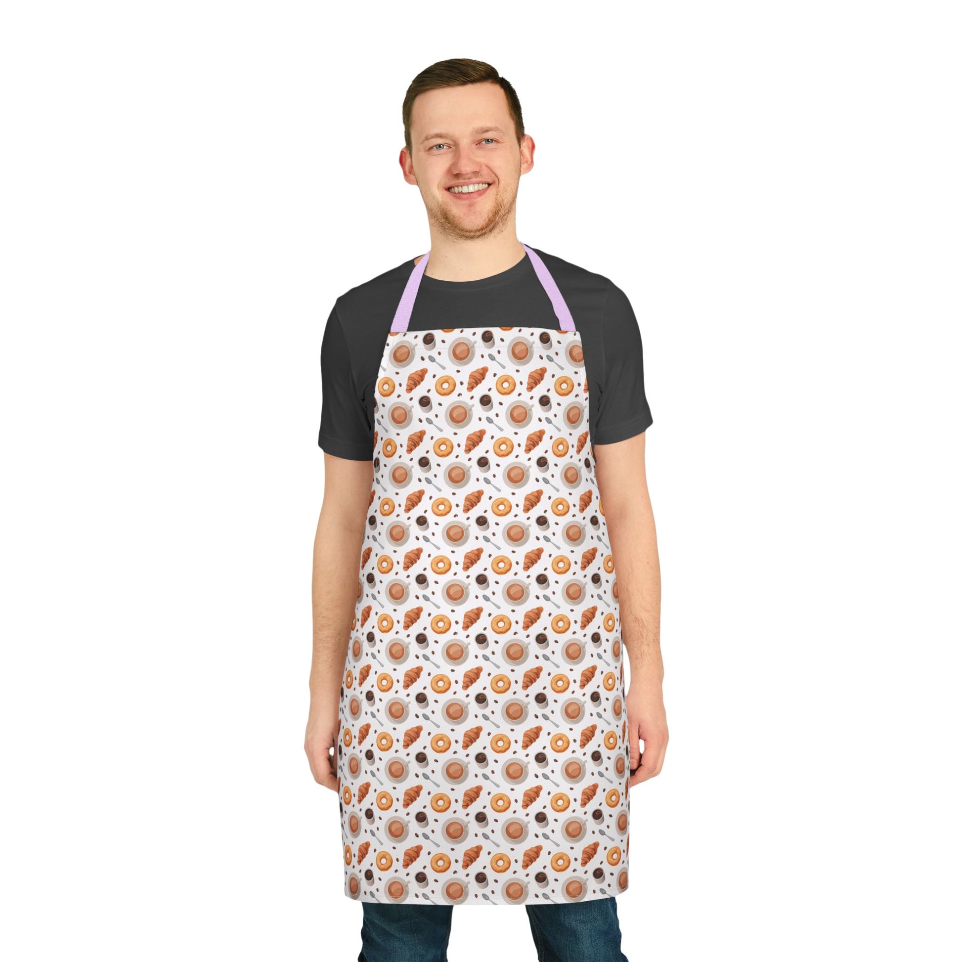 Man wearing the Apron Coffee Cups Donuts Croissants Beans Spoon, showcasing its playful design of coffee-themed elements. Made of soft, stain-free polyester canvas, perfect for baking or hosting brunches.