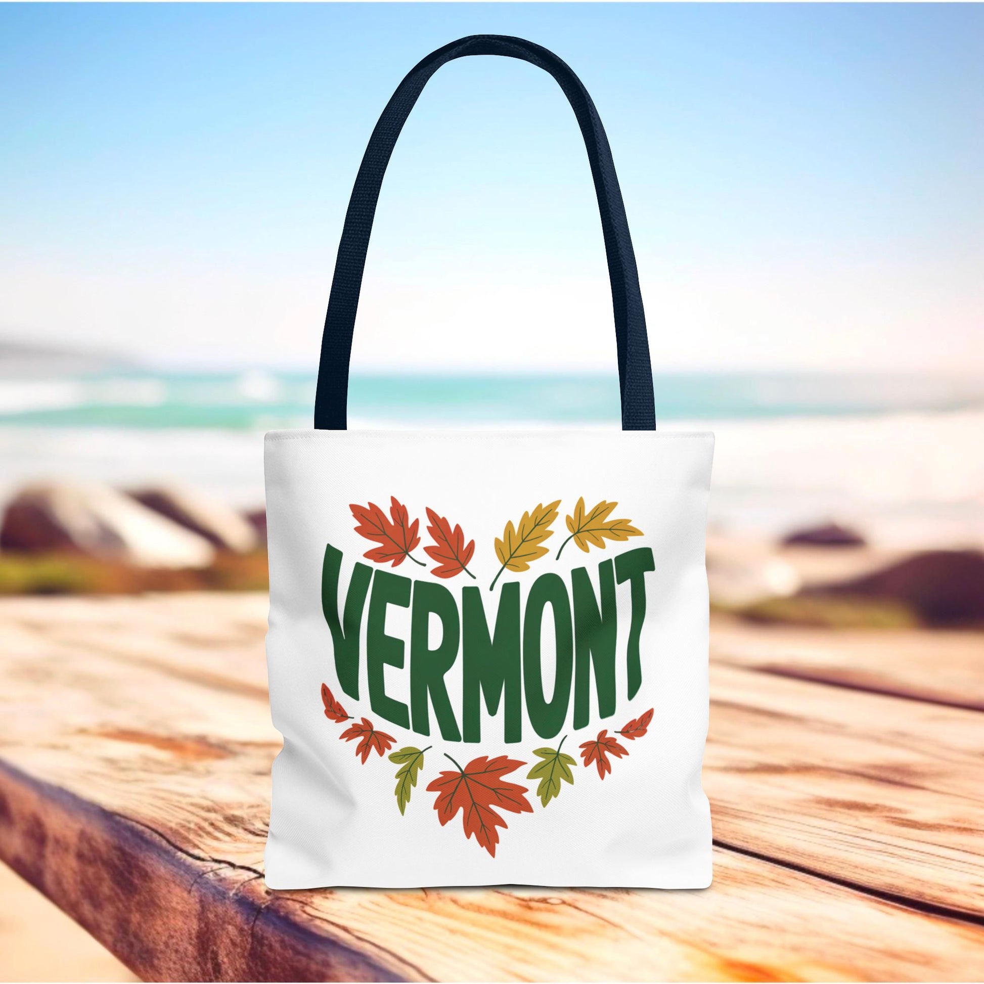 Vermont Tote Bag showcasing green and orange leaf pattern, embodies FireBrook Designs' blend of style and durability, perfect for daily essentials with reinforced handles and spacious boxed corners.
