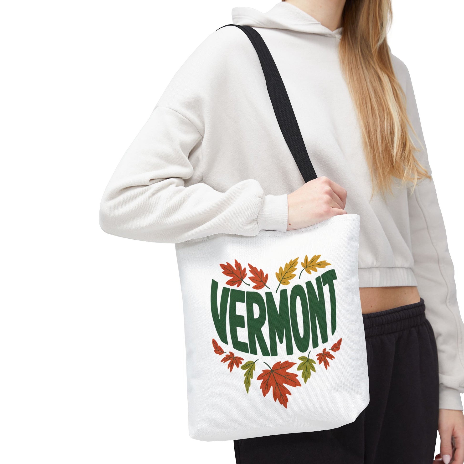 Vermont Tote Bag held by a person, showcasing its stylish design and reinforced stitching. Ideal for daily use, this durable accessory epitomizes FireBrook Essentials' blend of functionality and uplifting style.