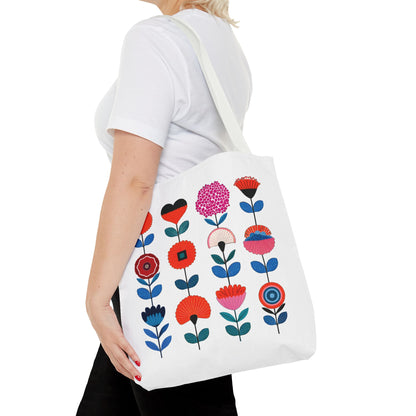 Floral Pattern Tote Bag: Woman carrying a durable, stylish tote with colorful floral design, perfect for daily use and outdoor adventures. Ideal for enhancing everyday functionality.